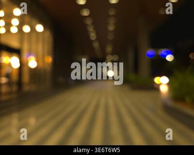 Passerelle bokeh astratte nel Modern Technology Park - sfondo architettonico illuminato del campus aziendale Foto Stock