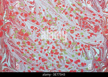 Colorato sfondo astratto Ebru marmorizzato con vivaci vortici di inchiostro liquido e texture artistica Foto Stock