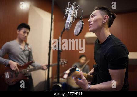 Cinese banda musicale in studio di registrazione Foto Stock