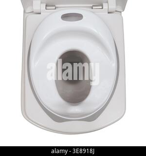 WC bianco con riduttore per bambini sopra il WC per adulti. Adattatore per vasino in plastica per bambini piccoli. Accessori per l'igiene del bagno e per chi Foto Stock