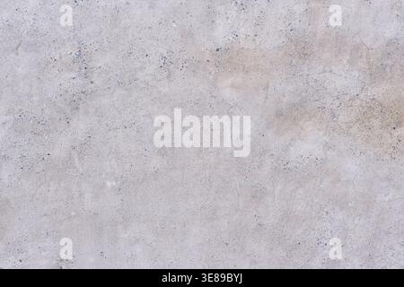 Primo piano di autentiche pareti intemprate con un mix di argilla naturale, gesso e piccole pietre. Perfetto per minimi storici, architettonici o organici Foto Stock