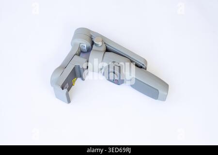 Stabilizzatore telescopico pieghevole isolato su sfondo bianco Foto Stock