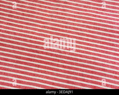 Texture macro in tessuto a righe rosse e bianche Foto Stock