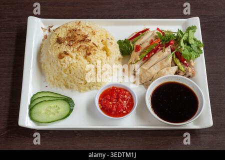 Riso di pollo Hainanese - tipica cucina cinese servita nel Regno Unito Foto Stock