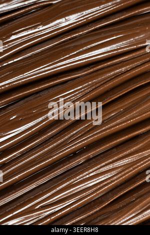 Vista dall'alto sfondo di cottura astratto, grana dilatazione cioccolato Foto Stock