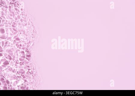 Banner di rosa Abstract acqua di fondo texture con ondate e onde. Spazio di copia Foto Stock