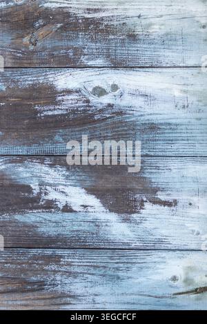 Struttura di fondo delle tavole di legno invecchiate con peeling bianco e blu. Full frame Foto Stock