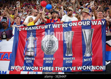 LEIPZIG, GERMANY - 27th May 2026:  Crystal Palace fans display a banner celebrating winning three trophies in the last year, and targeting the Europa League trophy in Frankfurt in 2027, after the UEFA Conference League Final match between Crystal Palace FC and Rayo Vallecano de Madrid at the Red Bull Arena  (Credit: Craig Mercer/ Alamy Live News) Foto Stock