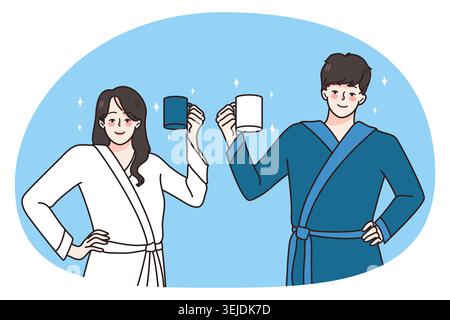 Buon paio di accappatoi con tazze al mattino Foto Stock