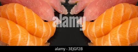 Foto macro del sushi al nigiri di salmone e del susi al tonno maguro. Susi Set Rolls con pesce rosso crudo su un piatto di pietra scura da vicino Foto Stock