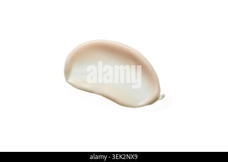 La crema cosmetica beige crea un elegante striscio di texture, mostrando un prodotto di bellezza e un campione di dermocosmesi Foto Stock