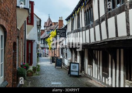 Church Lane a Ledbury, storica città commerciale nell'Herefordshire. Foto Stock