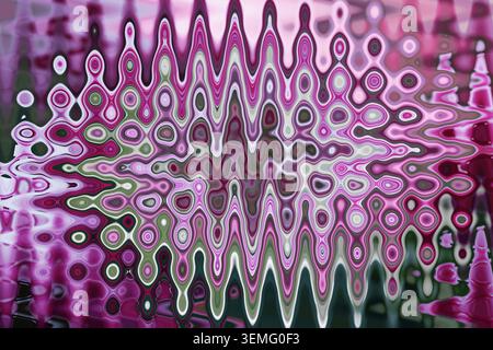 Caleidoscopio fluido magenta rosa verde astratto texture dal fiore ciclamino con motivo ovale verticale Starburst per poster da sfondo Foto Stock