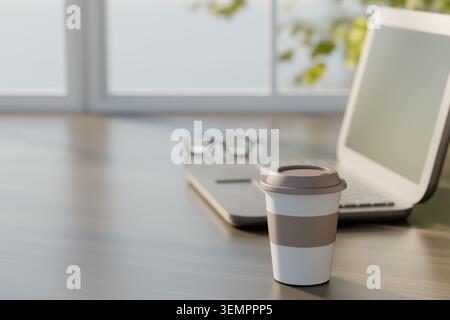 Rendering 3D di una tazza di caffè di carta su un tavolo di legno con un laptop sfocato e occhiali sullo sfondo. Concetto di lavoro a distanza, routine mattutina, coz Foto Stock