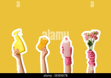 Mani che tengono in mano prodotti per la pulizia e fiori rosa su sfondo giallo per la pulizia di primavera e la cura della casa, quattro mani tengono vari oggetti contro una zampa Foto Stock