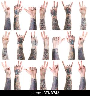 Uomo che mostra le mani tatuate, primo piano. Serie di gesti su sfondo bianco Foto Stock