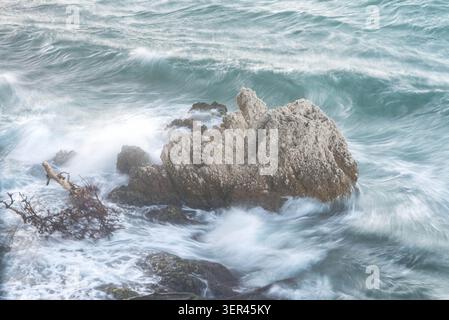 La roccia con il volto umano. Foto Stock