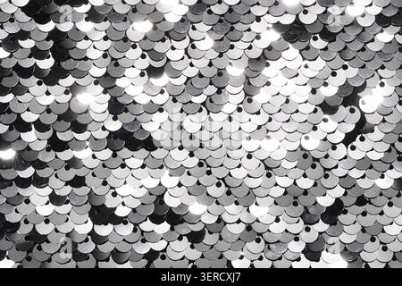 Sequin tessuto sfondo. Close-up shot di glittery nero texture di paillettes Foto Stock