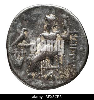 Una moneta da dracma d'argento del regno di Alessandro III il grande, coniata a Colofonte, Ionia, intorno al 323 a.C., durante l'autorità di Filippo III, re di Macedonia. Foto Stock