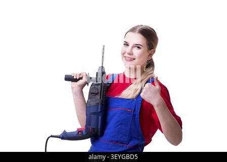 Giovane donna con il trapano elettrico isolato su bianco Foto Stock