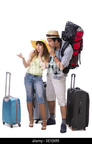 Giovane famiglia preparando per andare in vacanza su bianco Foto Stock
