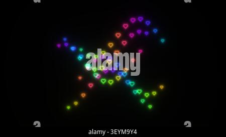 Le forme luminose del cuore in vari colori sono disposte in un motivo sparso su uno sfondo scuro. Le forme colorate creano una vivace e vibrante a Foto Stock