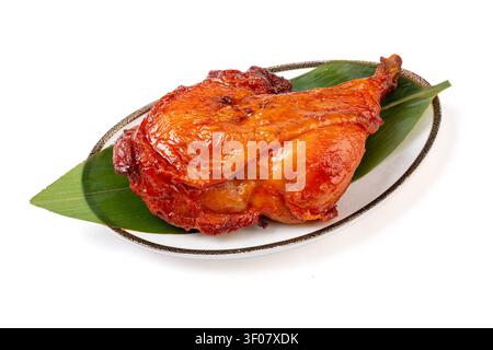 Cosce di pollo intere glassate stile Orleans, quarti di pollame arrostiti al BBQ, marinata al miele Foto Stock