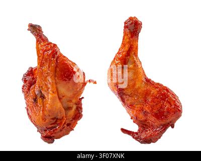 Cosce di pollo intere arrostite allo stile Orleans, quarti di pollame grigliati al BBQ, marinata dolce e piccante Foto Stock