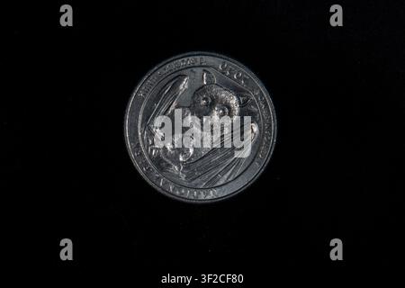 National Park of American Samoa Quarter, una delle monete America the Beautiful del 2020 coniate nel 2020. Mostra un pipistrello frutta samoano su un lato. Foto Stock