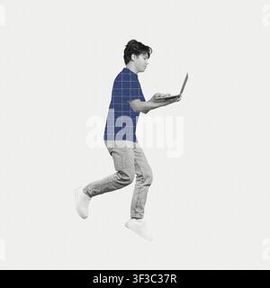Giovane uomo asiatico che salta con un laptop, espressione concentrata, concetto aziendale Foto Stock