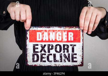 Il messaggio di declino delle esportazioni di pericolo indica incertezza economica e pressione commerciale internazionale Foto Stock