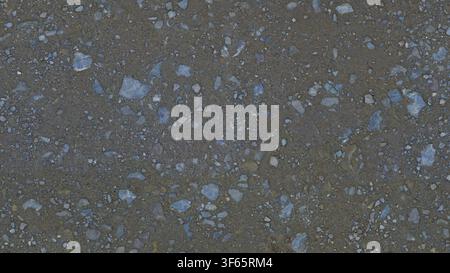 Vista dall'alto di piccole pietre di ghiaia blu grigio mescolate con terra sul terreno. Foto Stock
