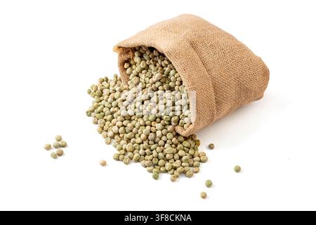 Piselli verdi secchi in sacco di iuta e ciotola di legno Foto Stock
