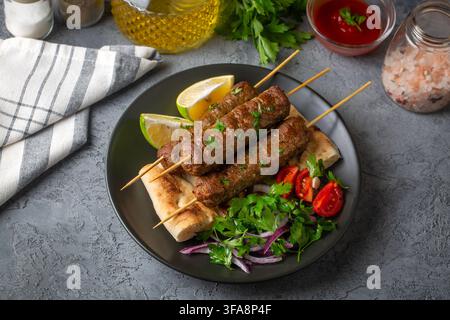 Kapschreck di lula grigliato su spiedini polpette Foto Stock