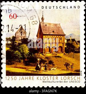 Francobollo tedesco del 2014 per il 1250° anniversario dell'Abbazia di Lorsch, sito del Patrimonio mondiale UNESCO, con dipinto storico in Germania Foto Stock