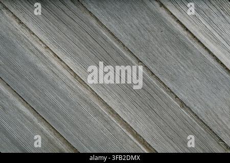 Vecchie assi di legno diagonali naturali con sfondo texture, colore grigio Foto Stock