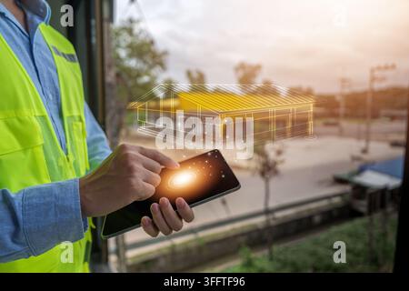 Ingeniero edile utilizza un tablet con sovrapposizione di progetto digitale per la progettazione di architettura intelligente Foto Stock