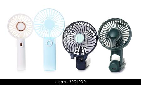 Molti mini ventilatori portatili isolati su bianco Foto Stock