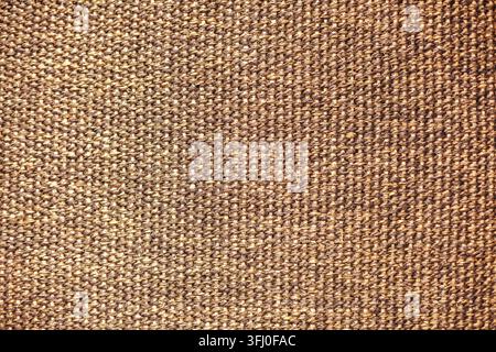 Tessuto in iuta marrone con fili tessuti naturali grossolani in stile rustico Foto Stock