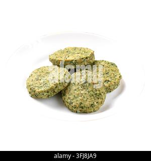 Polpette di tacchino e verdure su piatto bianco Foto Stock