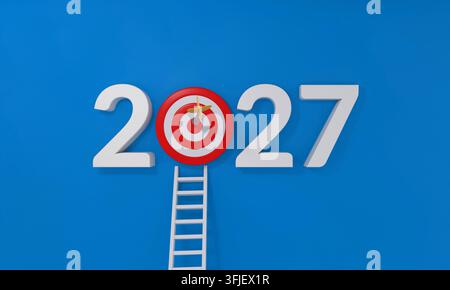 Numeri dell'anno 2027 e un bersaglio da freccette con una freccia che colpisce il centro, rappresentativi del raggiungimento di obiettivi futuri e della pianificazione strategica Foto Stock