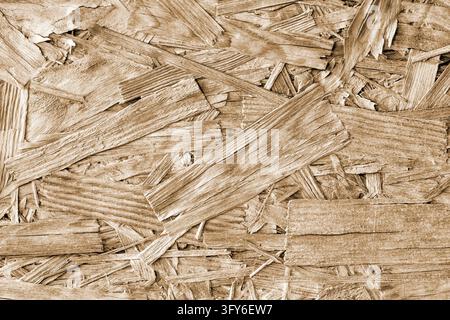 Textura del legno. Antico pannello di particelle. Texture di fondo marrone. Foto Stock