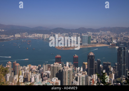 dh Hong Kong Harbour SHEUNG WAN HONG KONG Office Block grattacieli torre lungomare vista porto Tsim Sha Tsui West grattacielo torri paesaggio urbano Foto Stock