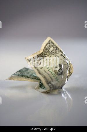 Uno accartocciata dollaro Foto Stock
