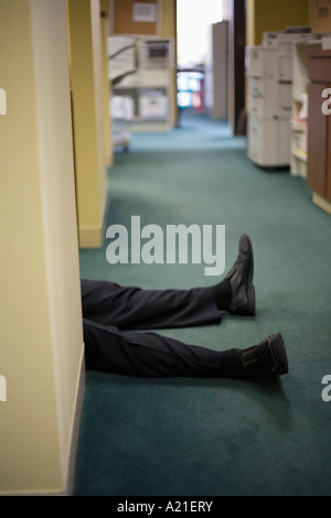 L uomo per le gambe in Office Foto Stock