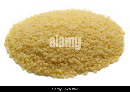 Il cous cous semolino fine granella di farina di frumento tumulo pila heap tutto pieno di granella granulo rotonda basic Foto Stock