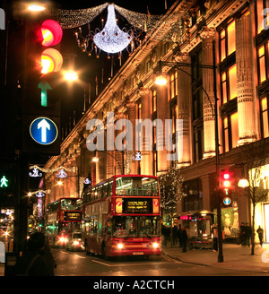 Magazzini Selfridges e le decorazioni di Natale e le luci in Oxford Street Londra Foto Stock