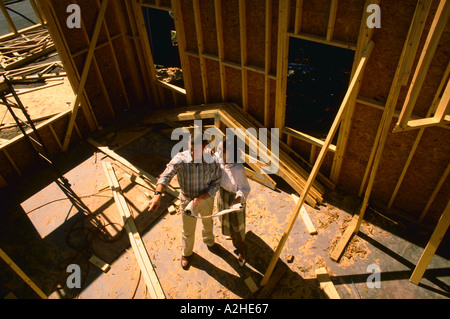 Coppia al sito in costruzione Foto Stock