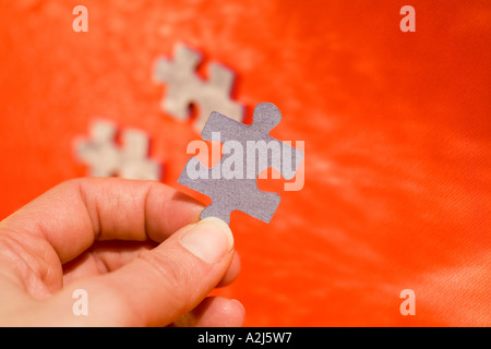 Le manca un pezzo del puzzle Foto Stock