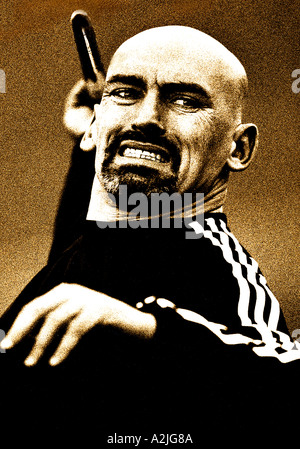 Età maschio 25-30,testa rasata gettando un giavellotto. Foto Stock